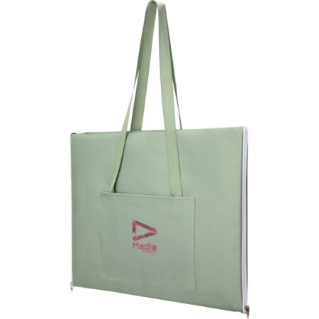 a green picnic blanket folded into a bag